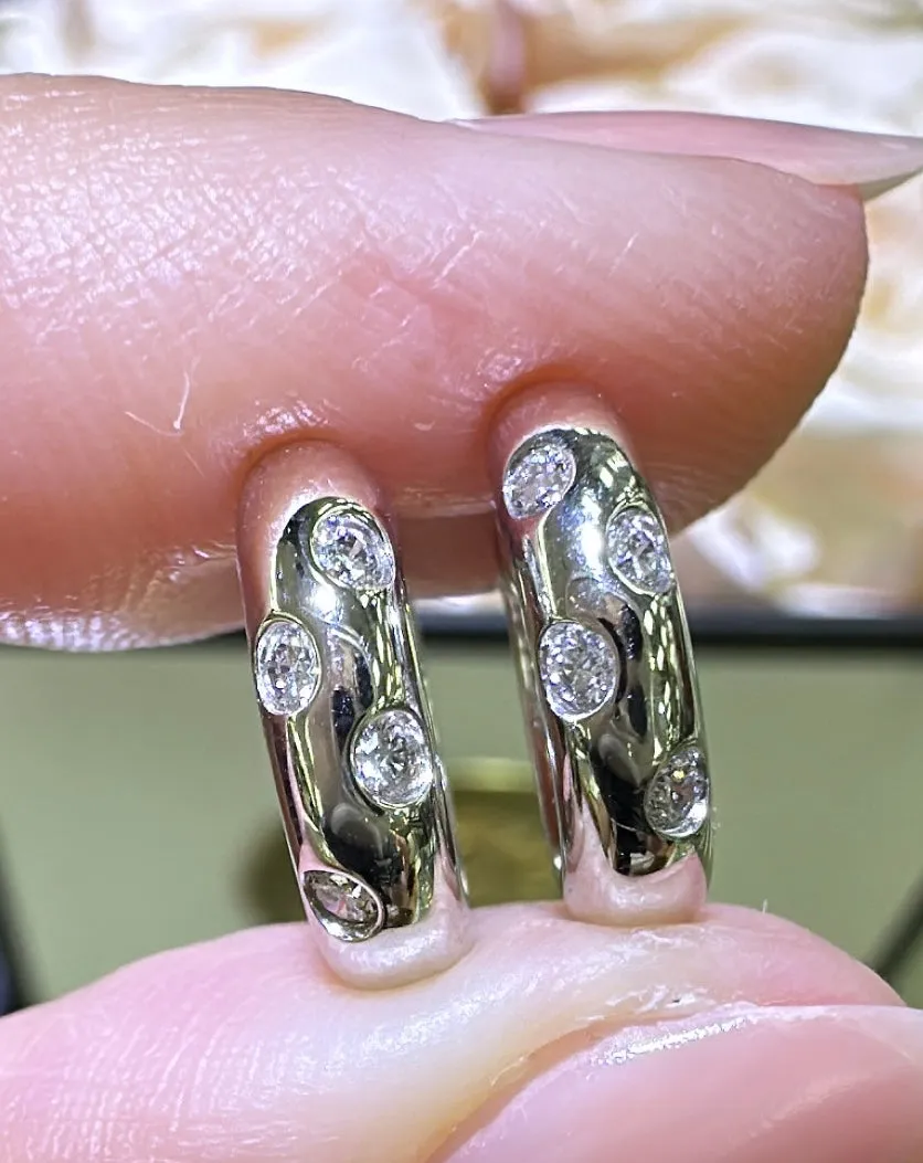 0.13ct tw Burnish Set Diamond Station Huggie Earrings