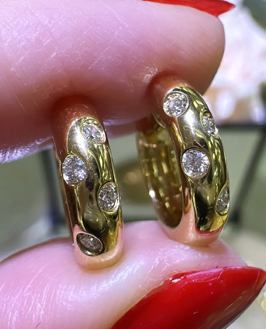 0.13ct tw Burnish Set Diamond Station Huggie Earrings