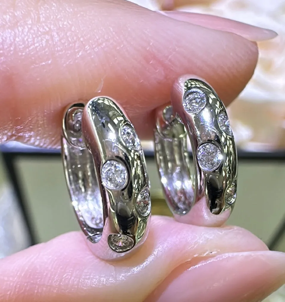 0.13ct tw Burnish Set Diamond Station Huggie Earrings