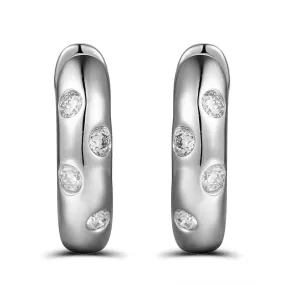 0.13ct tw Burnish Set Diamond Station Huggie Earrings