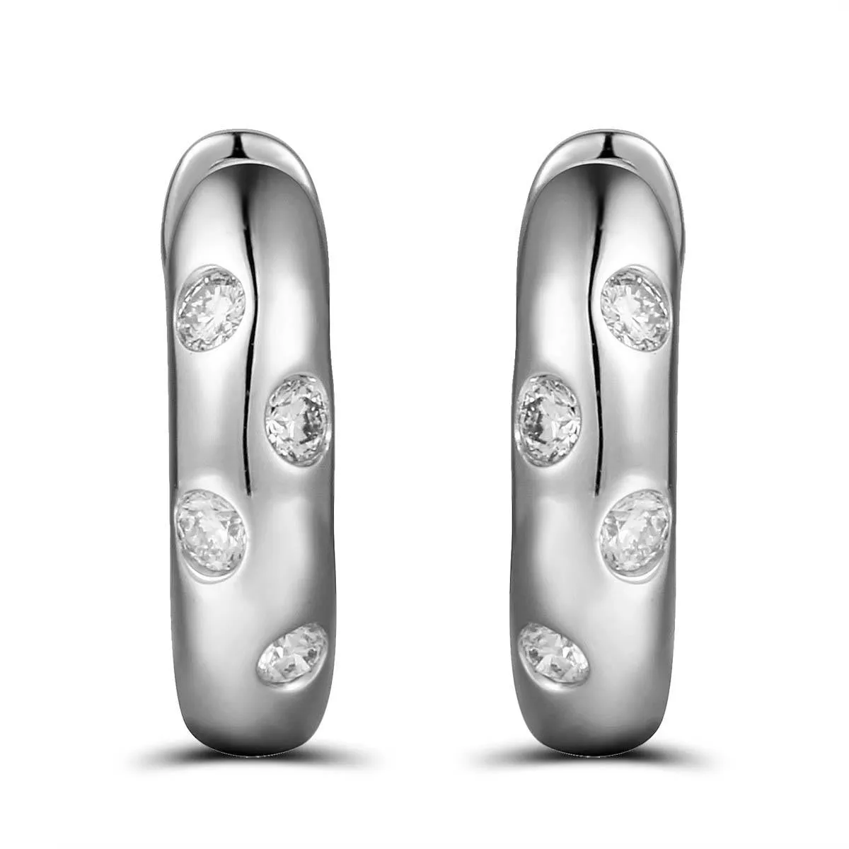 0.13ct tw Burnish Set Diamond Station Huggie Earrings