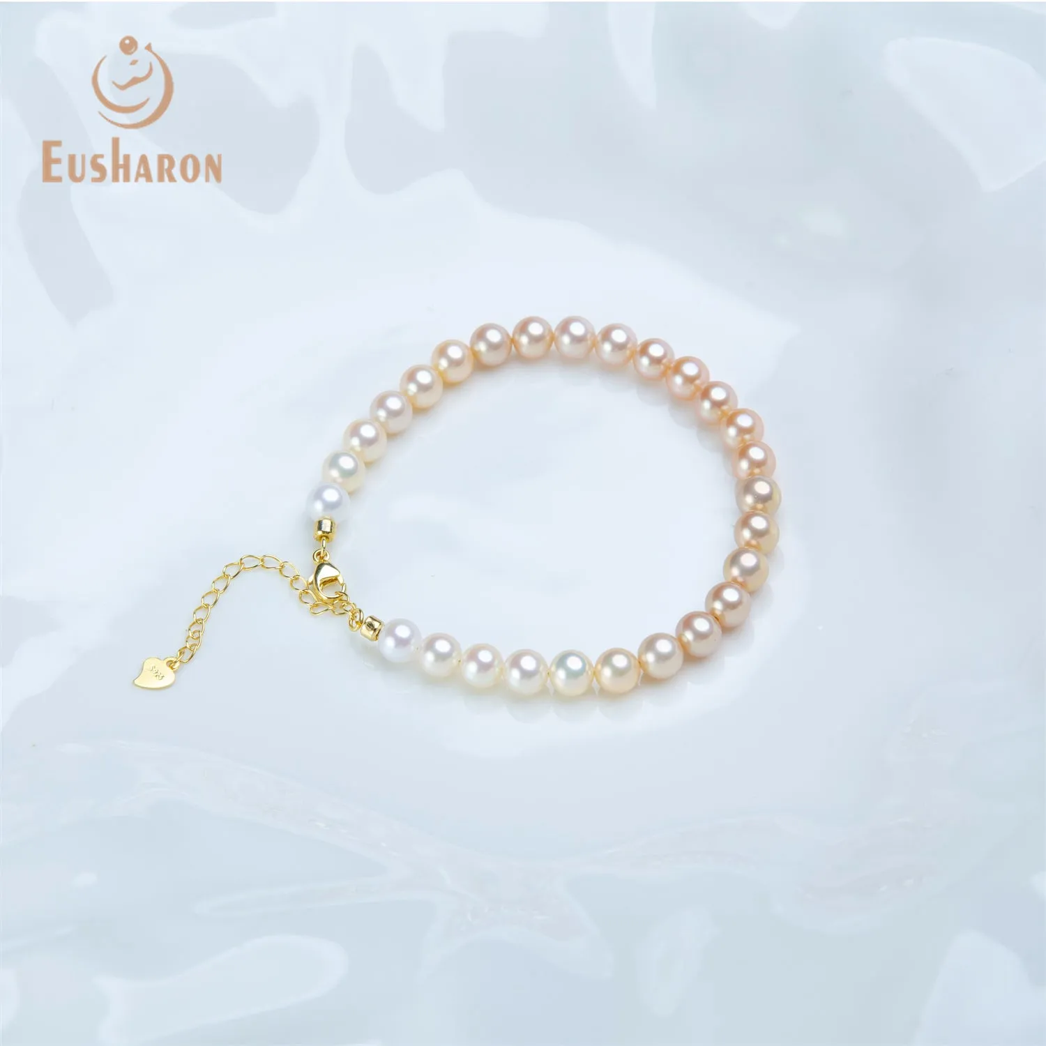 6-6.5mm SAAA Graduated Orange Color Round Freshwater Pearl Bracelet
