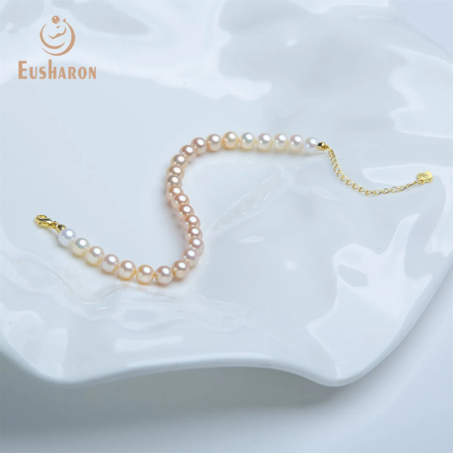 6-6.5mm SAAA Graduated Orange Color Round Freshwater Pearl Bracelet