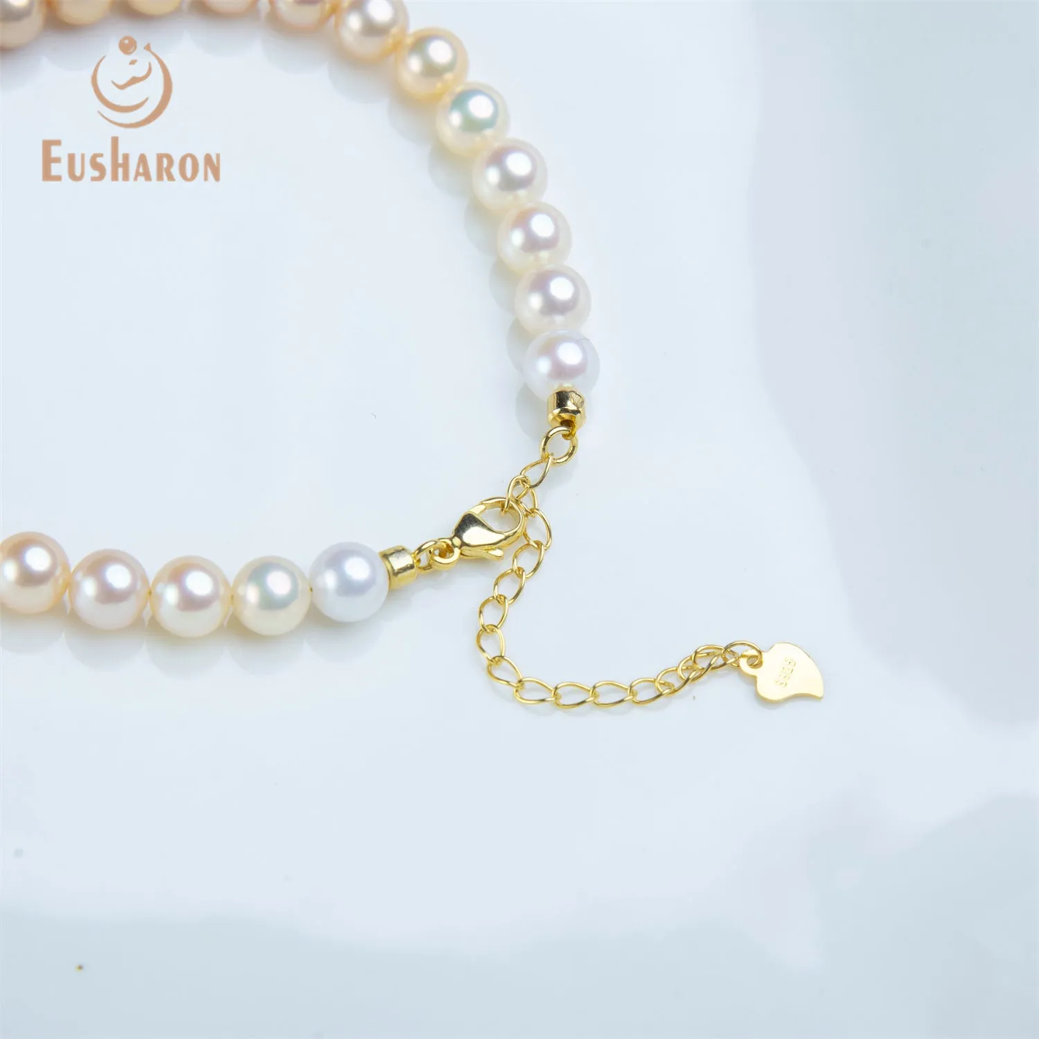 6-6.5mm SAAA Graduated Orange Color Round Freshwater Pearl Bracelet