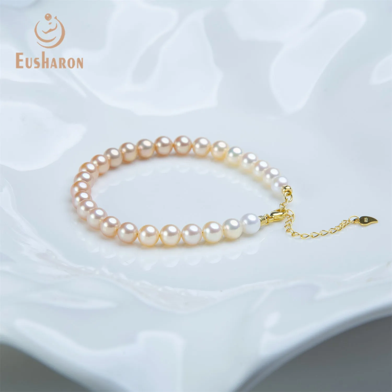 6-6.5mm SAAA Graduated Orange Color Round Freshwater Pearl Bracelet