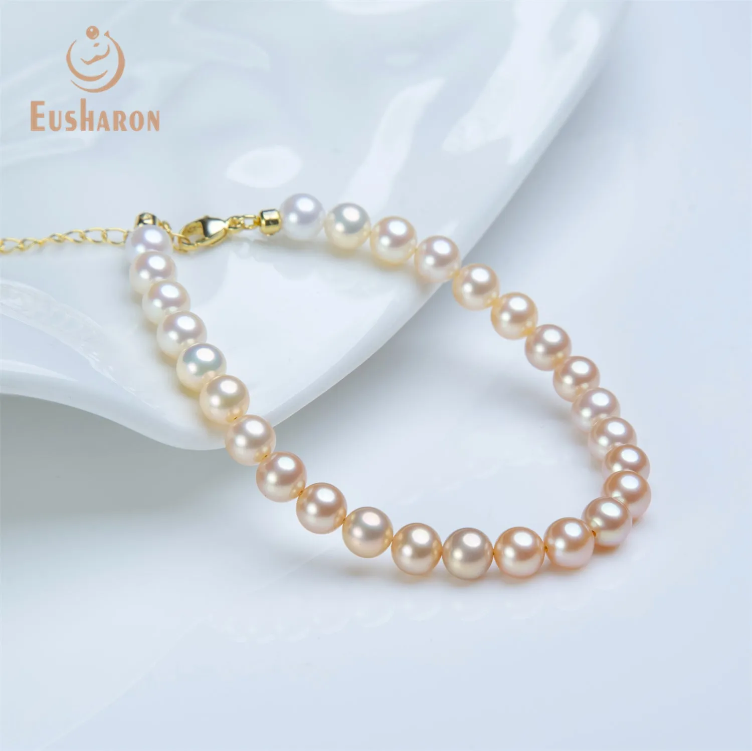 6-6.5mm SAAA Graduated Orange Color Round Freshwater Pearl Bracelet