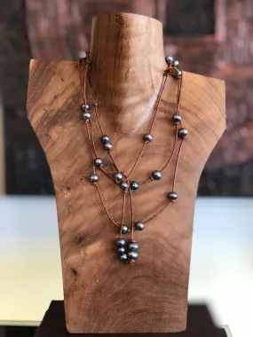 Peacock Freshwater Pearls on Leather