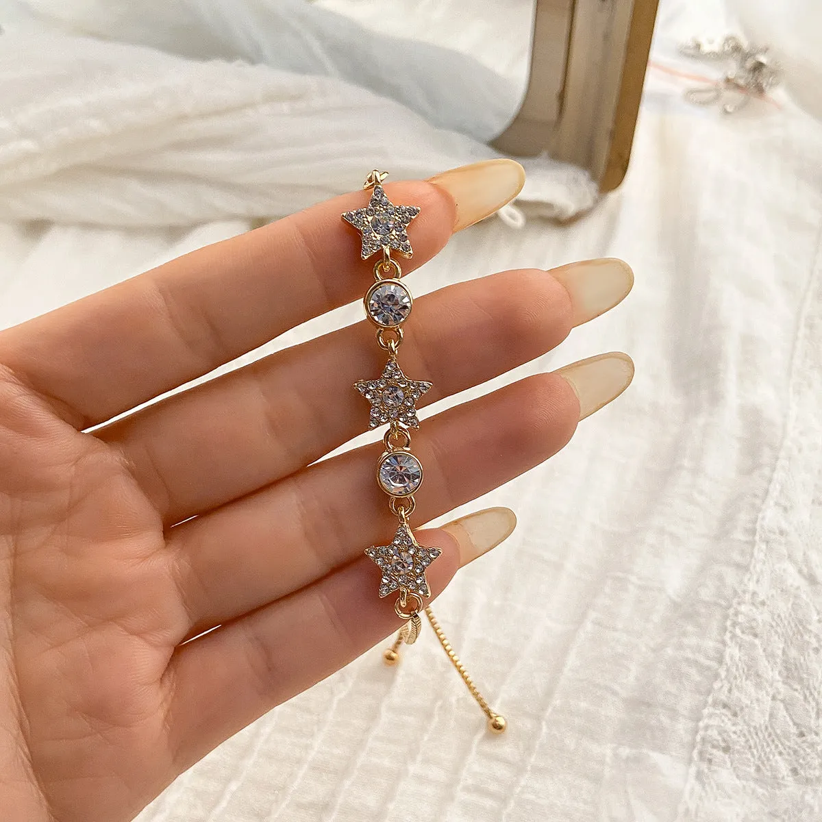 Rhinestone Adjustable Bracelet with Star and Flower Design